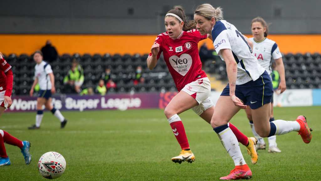 A women's football match taking place