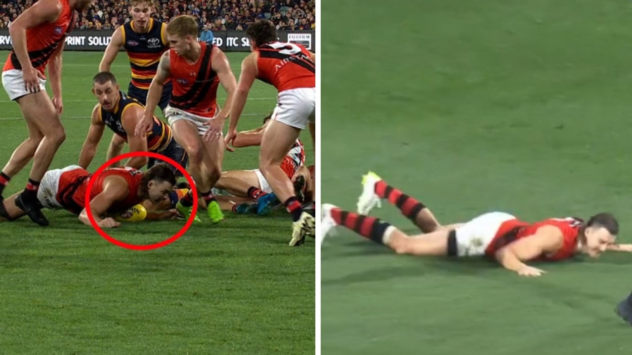 Sam Draper dives on ball in end of Essendon Bombers win over Adelaide Crows, referee doesn't call for holding ball, Draper taunted, Taylor Walker, video, reaction, reaction, latest news