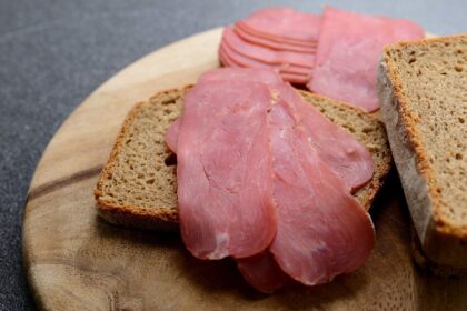 Reducing processed meat intake may have significant health benefits, research suggests