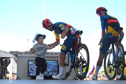 Tour de France cyclist fined for kissing wife and son, says punishment was worth it for 'dream moment'