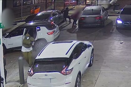 Armed men hinder car at gas station in gruesome surveillance footage