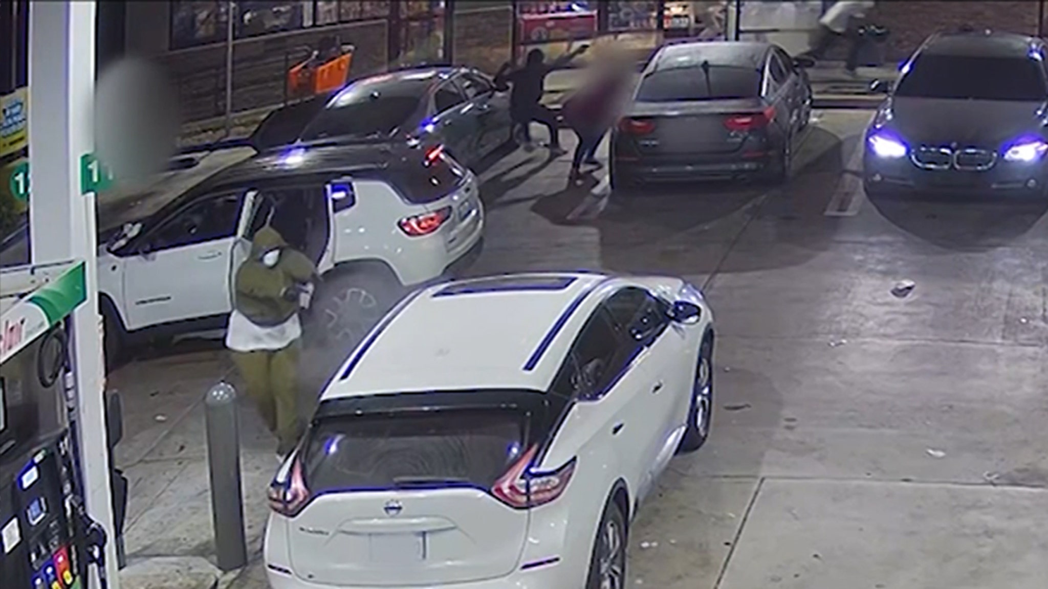 Armed men hinder car at gas station in gruesome surveillance footage