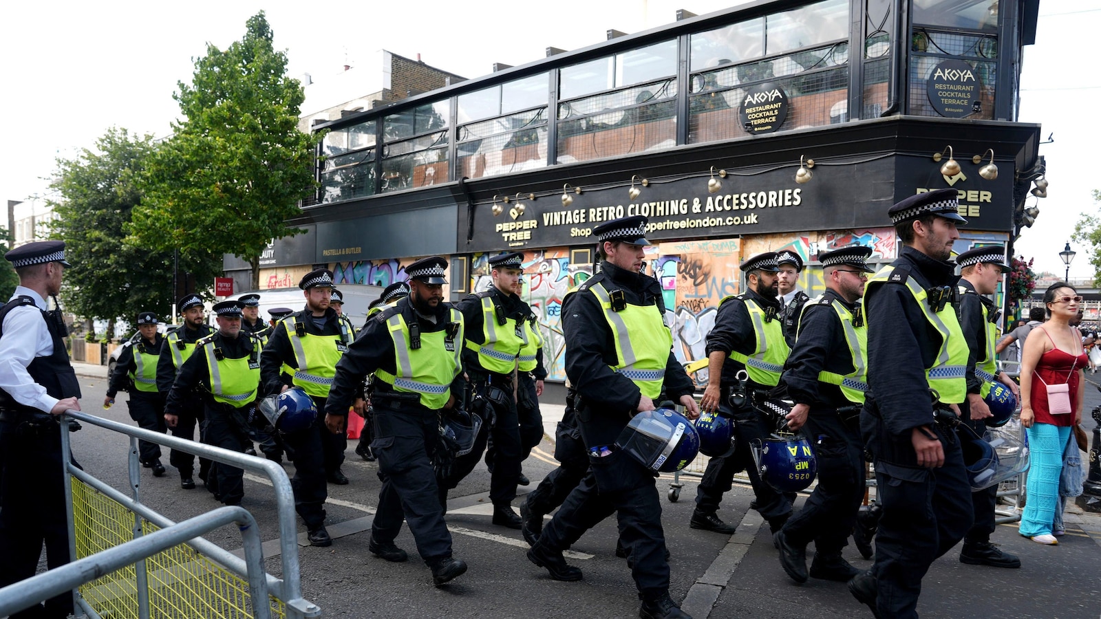 Police say two people who were attacked during the Notting Hill Carnival in London have died