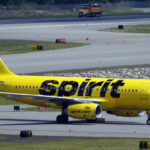 Spirit is betting on premium travel in an effort to turn around its company, ET TravelWorld