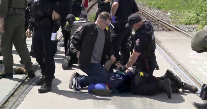 Thirteen protesters charged over rail blockade for Gaza solidarity in Vancouver