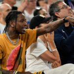 Travis Scott remains in French police custody following an altercation at a Paris hotel