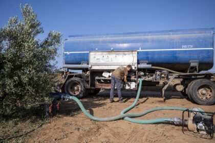 Water trucks keep olive trees alive in drought-stricken Greece