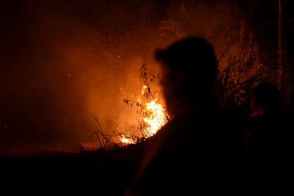 As the wildfires rage in Bolivia, the smoke turns to night