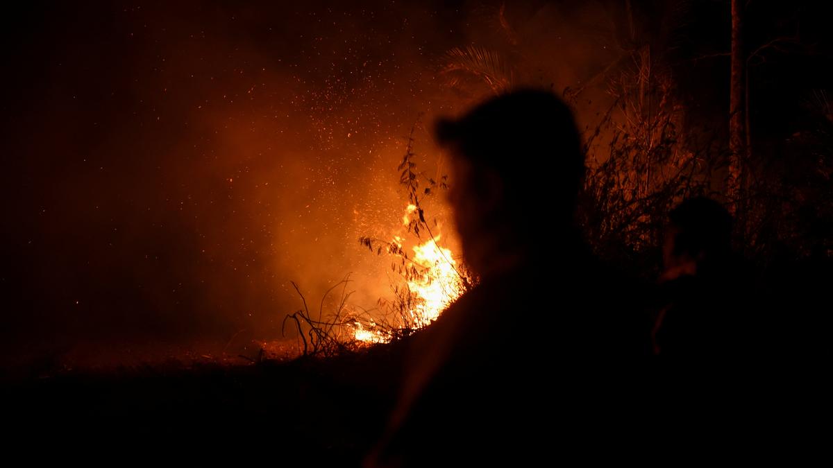 As the wildfires rage in Bolivia, the smoke turns to night