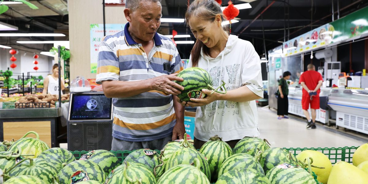 China's rising wave of 'full-time dads' is upending norms as more than half of Chinese men say they would stay at home