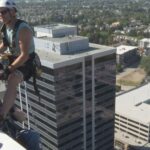 Fearless fundraisers climb down Kelowna Tower for Easter Seals Drop Zone - Okanagan