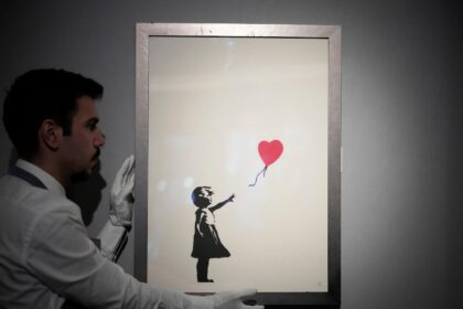 Two men accused of stealing a famous Banksy statue from a London art gallery